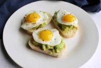 Elevated Avocado and Quail Egg Crostini