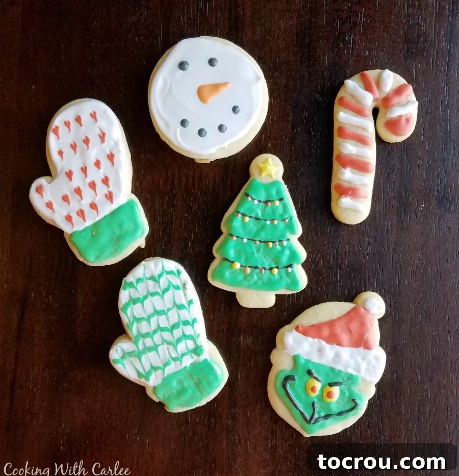 Go to sugar cookies cut into christmas shapes and decorated like mittens, the Grinch, a candy cane, snowman and Christmas trees with royal icing.