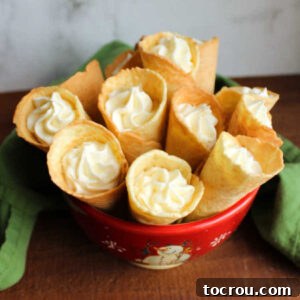 bowl of Russian buttercream filled krumkake horns.