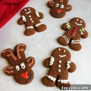 Classic Gingerbread Cookies Festive gingerbread man cookies and gingerbread Rudolph the Red-Nosed Reindeer cookies, beautifully decorated for Christmas.