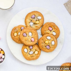 Plate of Cadbury Mini Egg cookies, ready to eat, showcasing their delightful appearance and inviting texture.
