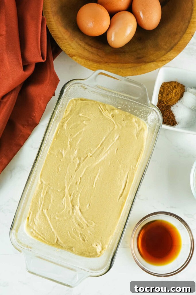Espresso Pound Cake 4 Coffee flavored pound cake batter in glass loaf pan ready to bake.