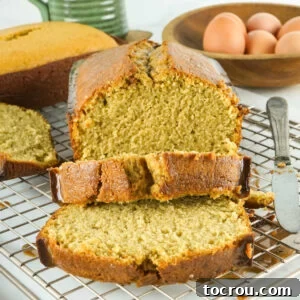 Slicing thick slices of coffee flavored pound cake with sweet coffee glaze.