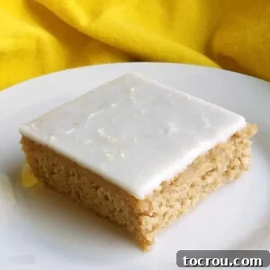 Sweet tea sheet cake topped with lemon icing for an Arnold Palmer cake.