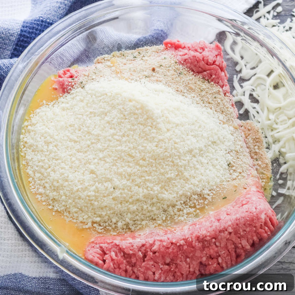 meatloaf ingredients in bowl ready to be mixed.