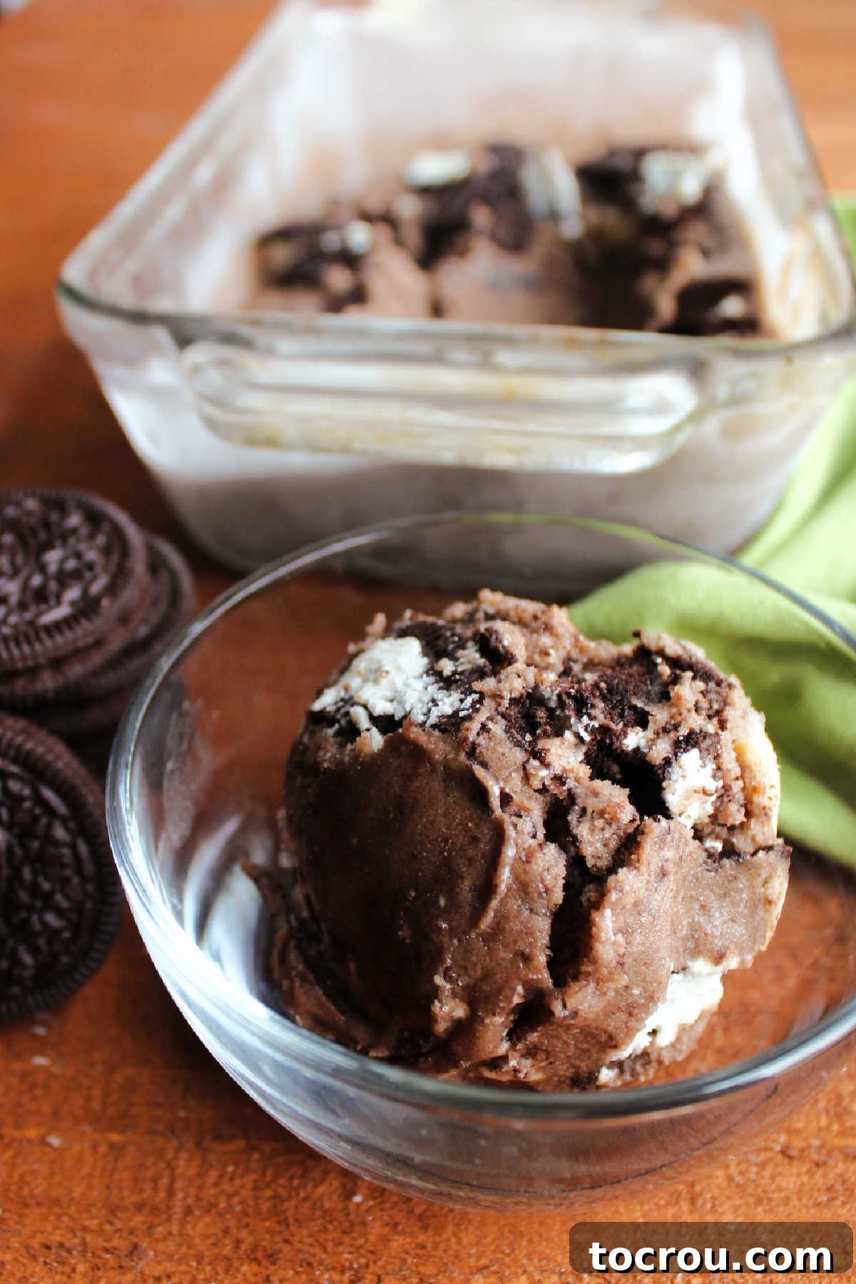 Scoop of cookies and cream nice cream with big Oreo chunks.