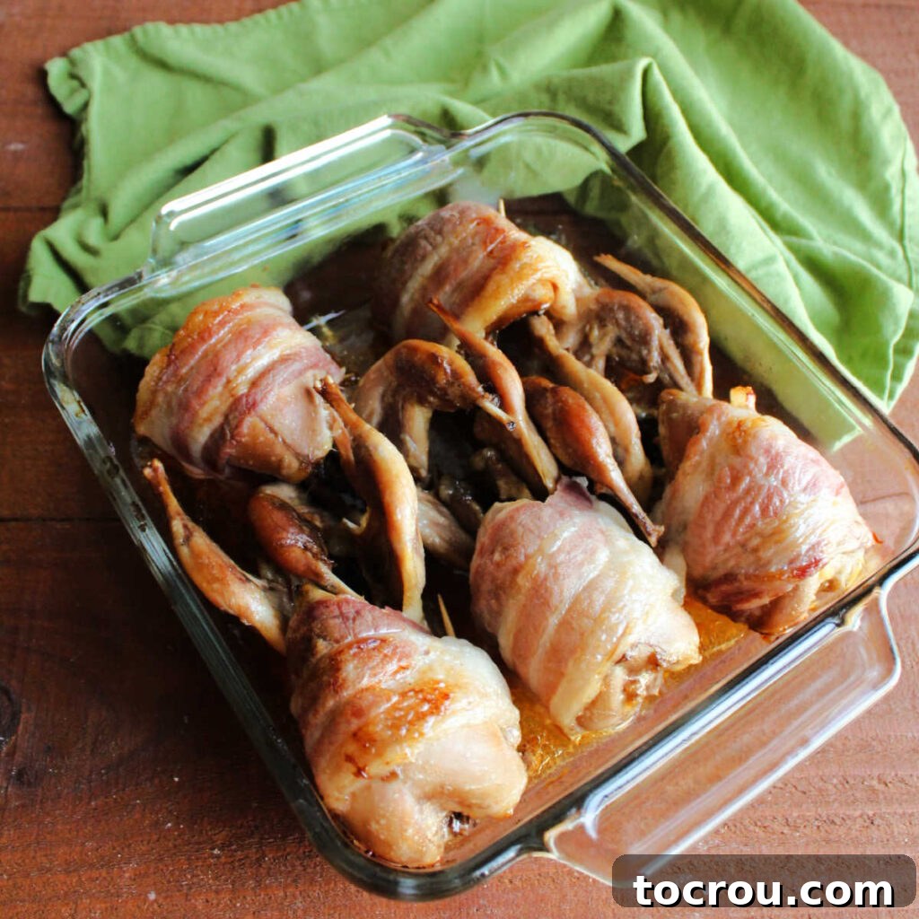 Golden Roasted Bacon Wrapped Quail 7 Roasted bacon wrapped quail fresh from the oven.