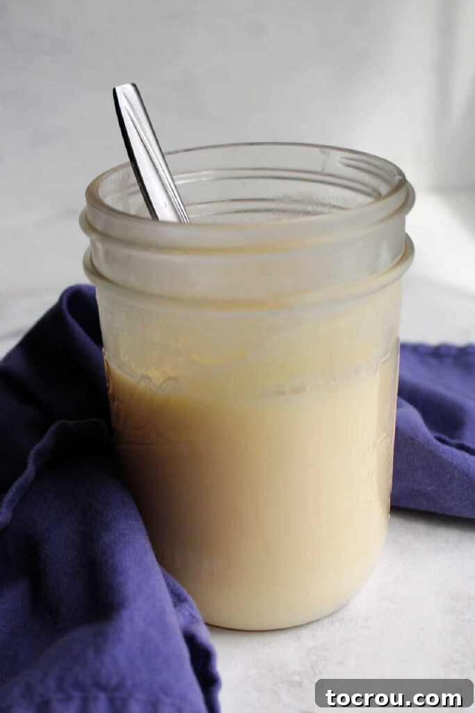 Jar of freshly made sweetened condensed milk.