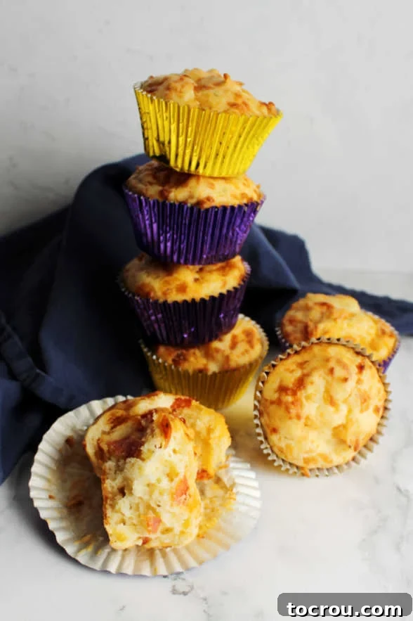 Stacks of pepperoni pizza muffins Several neatly arranged stacks of freshly baked pepperoni pizza muffins, artfully displayed and ready to be savored or thoughtfully packed.