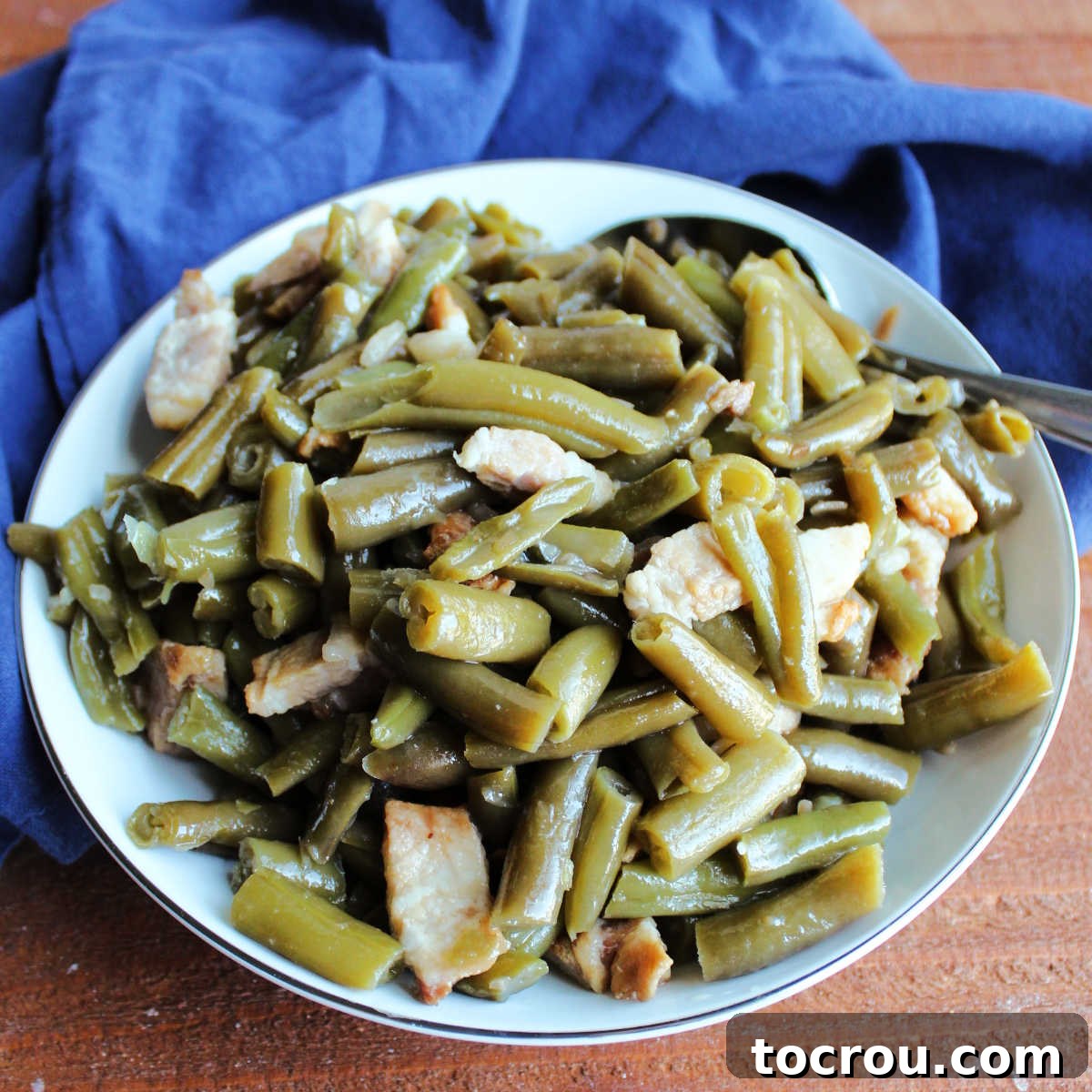 Bowl of green beans and bacon ready to serve.