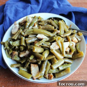 Bowl of green beans and bacon ready to serve.