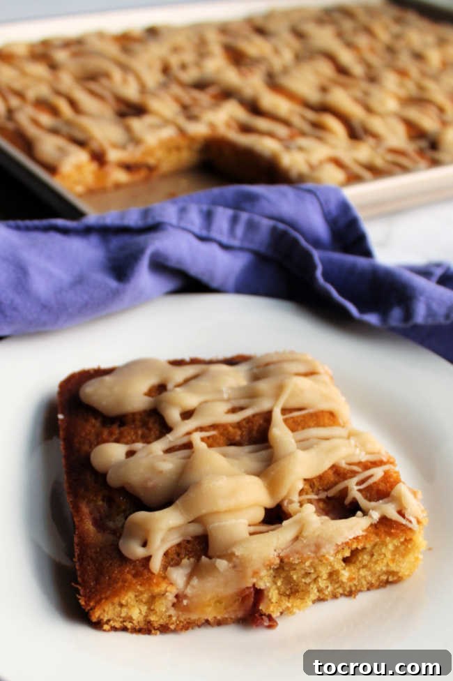Nutty Brown Butter Glaze 6 piece of brown sugar sheet cake topped with peaches and brown butter glaze.