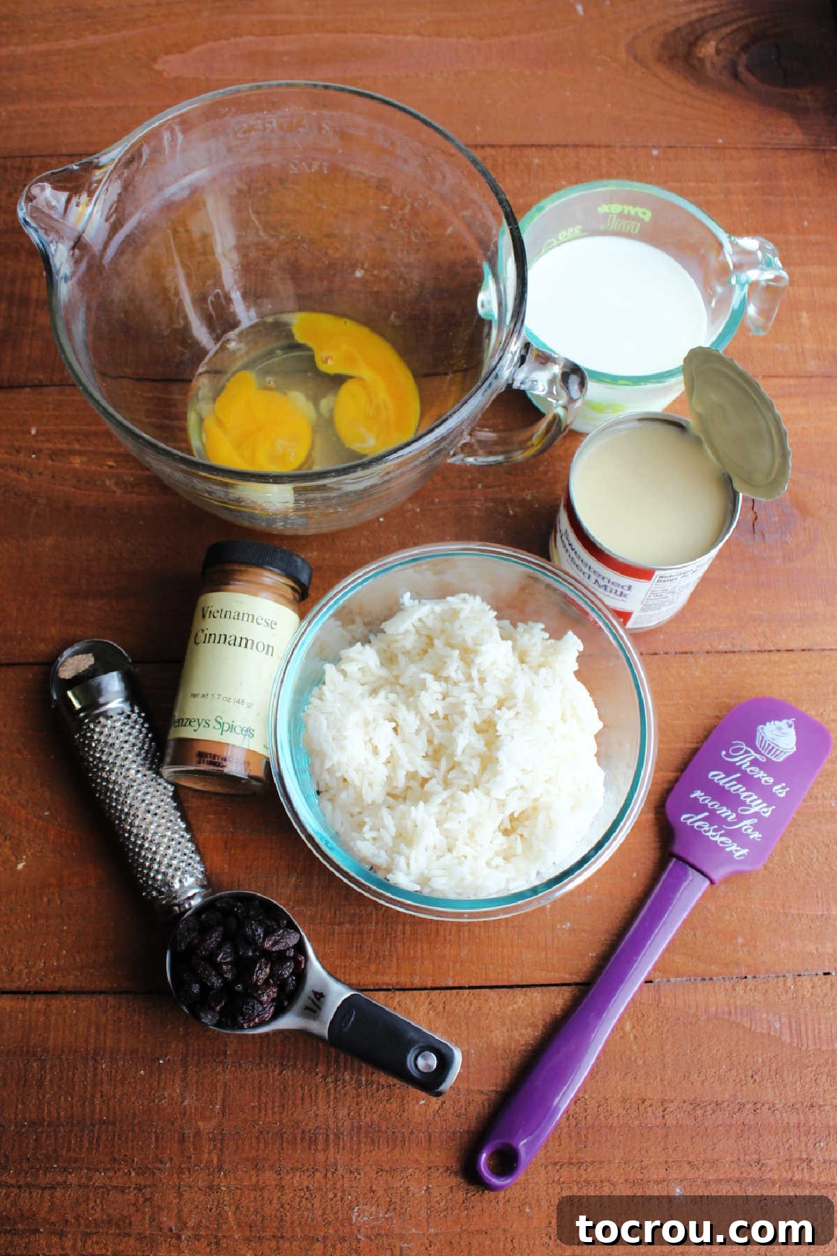 Velvety Condensed Milk Baked Rice Pudding 3 rice pudding ingredients including eggs, rice, sweetened condensed milk, milk and cinnamon ready to be made into rice pudding.