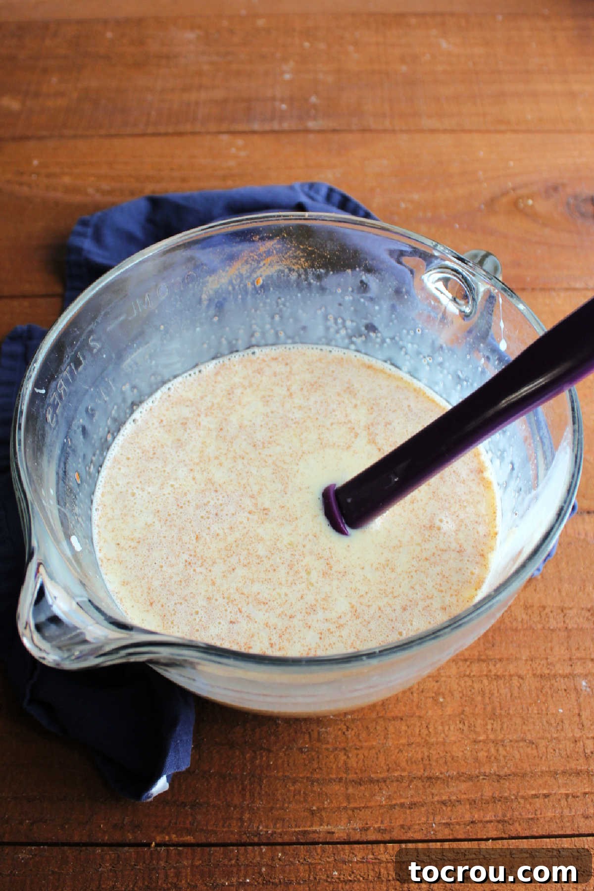 Velvety Condensed Milk Baked Rice Pudding 4 Mixing bowl of rice pudding mixture ready to go in pan.