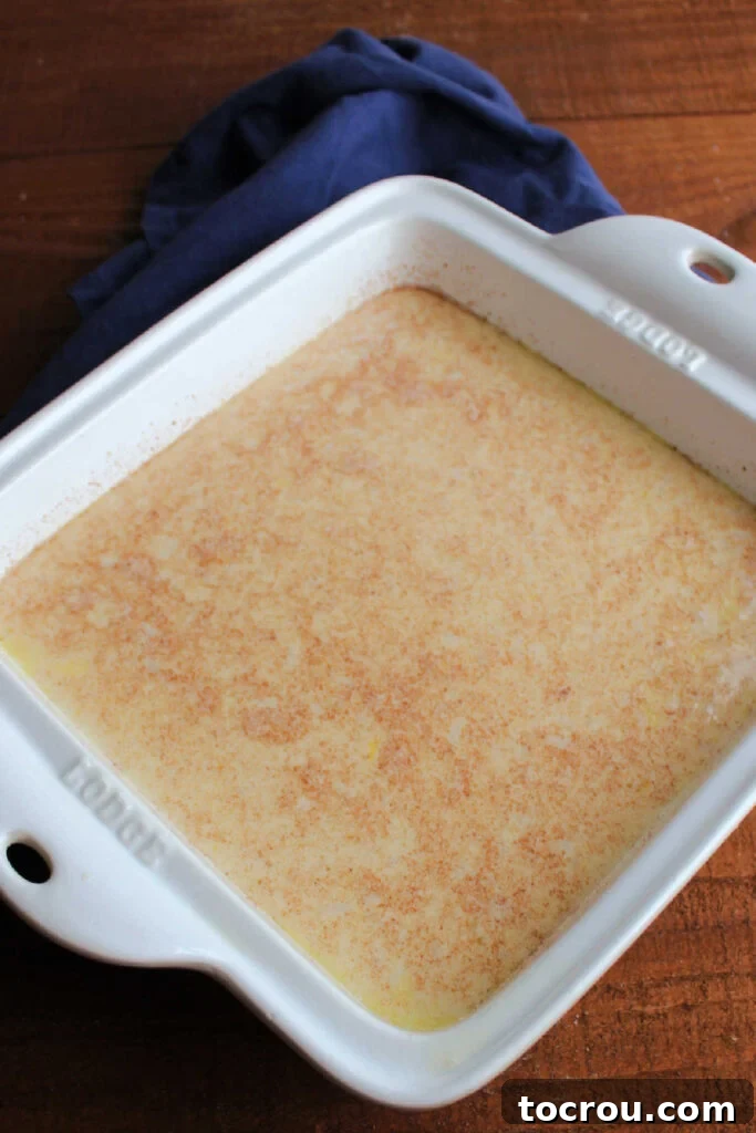 Velvety Condensed Milk Baked Rice Pudding 5 Pan of rice pudding mixture ready to bake.