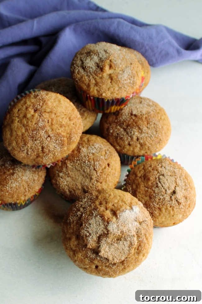 Batch of Fresh Cinnamon Muffins Pile of cinnamon muffins ready to eat