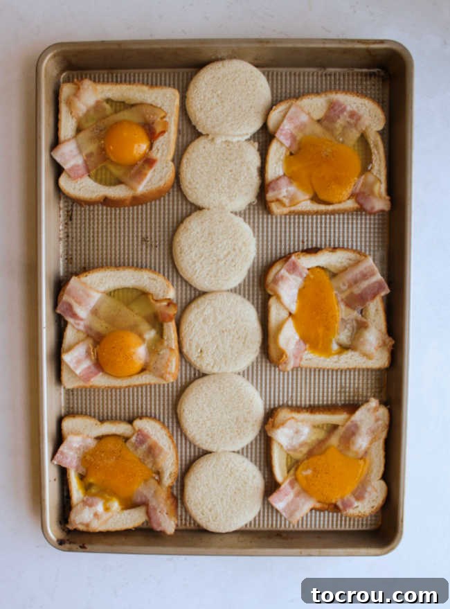 Prepped Sheet Pan Eggs in a Basket Before Baking Bread slices with bacon