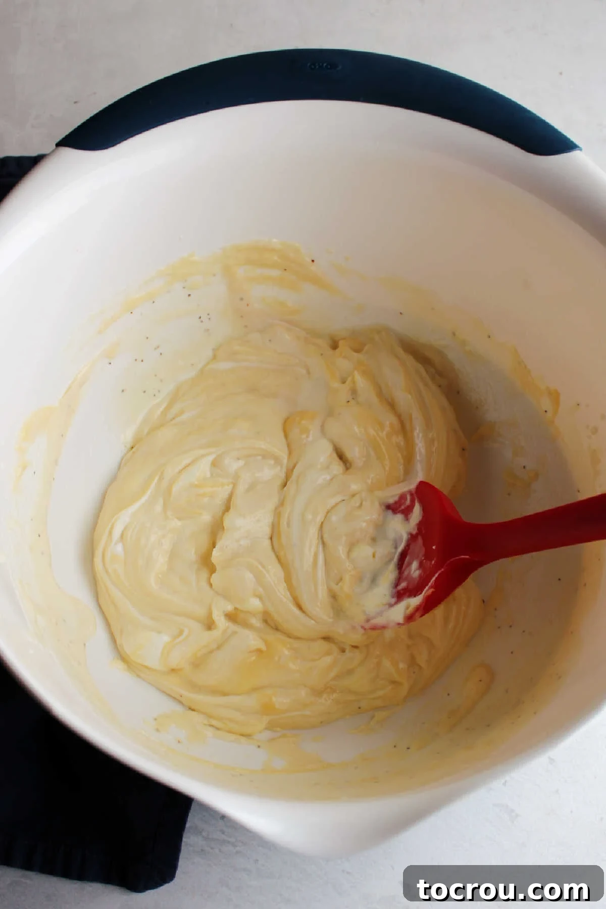 Ranch and Cream Mixture Mixture of ranch dressing, sour cream and cream of chicken soup in bowl.