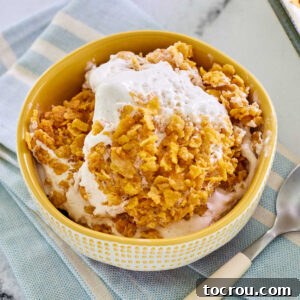 Bowl of fried ice cream bars with creamy vanilla and cinnamon ice cream mixture with caramelized bits of cornflakes for crunch.