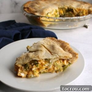 Pot pie filled with diced ham, broccoli, and cheese ready to eat.
