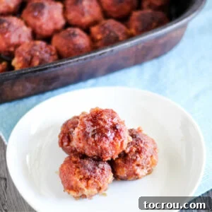 pile of glazed ham balls on plate.