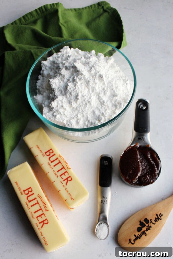 Ingredients: butter, salt, apple butter and powdered sugar ready to be made into frosting.