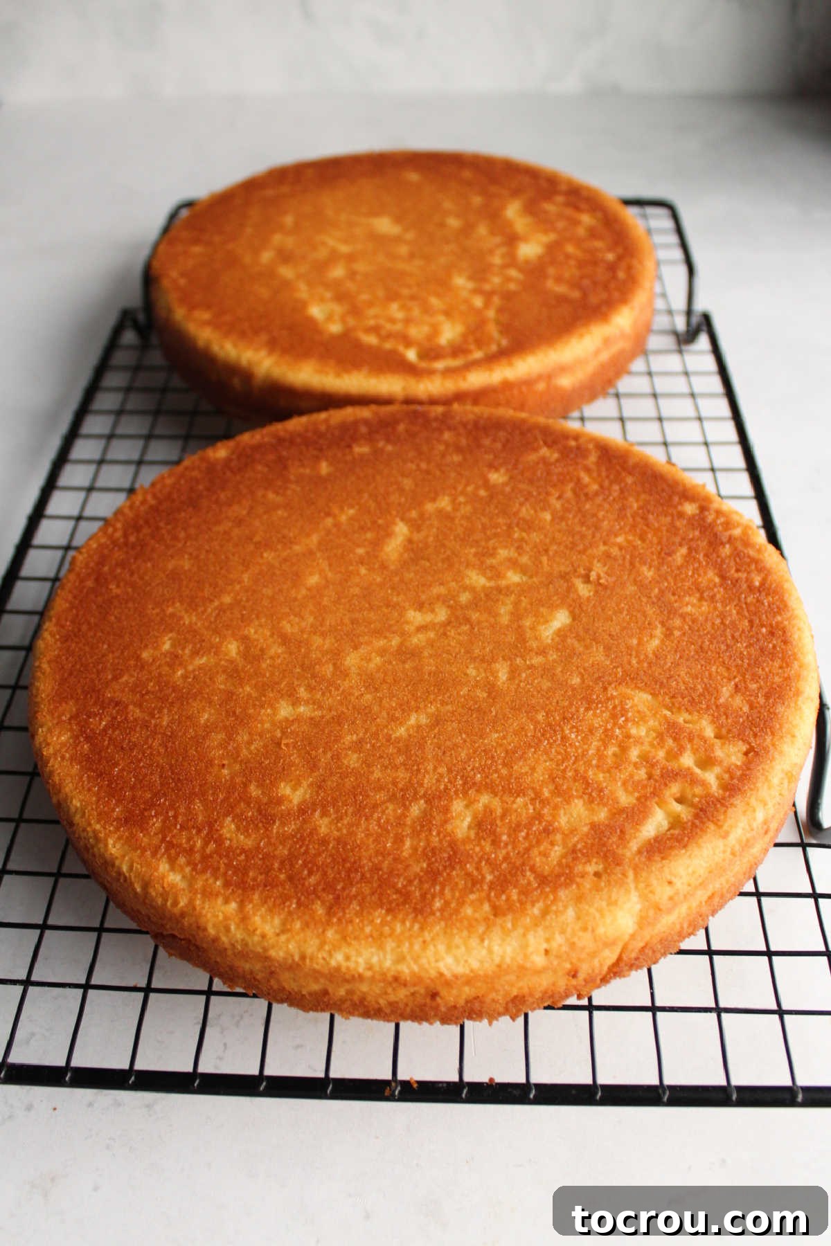 Lemon velvet cakes turned out of the pan cooling on a wire rack. 