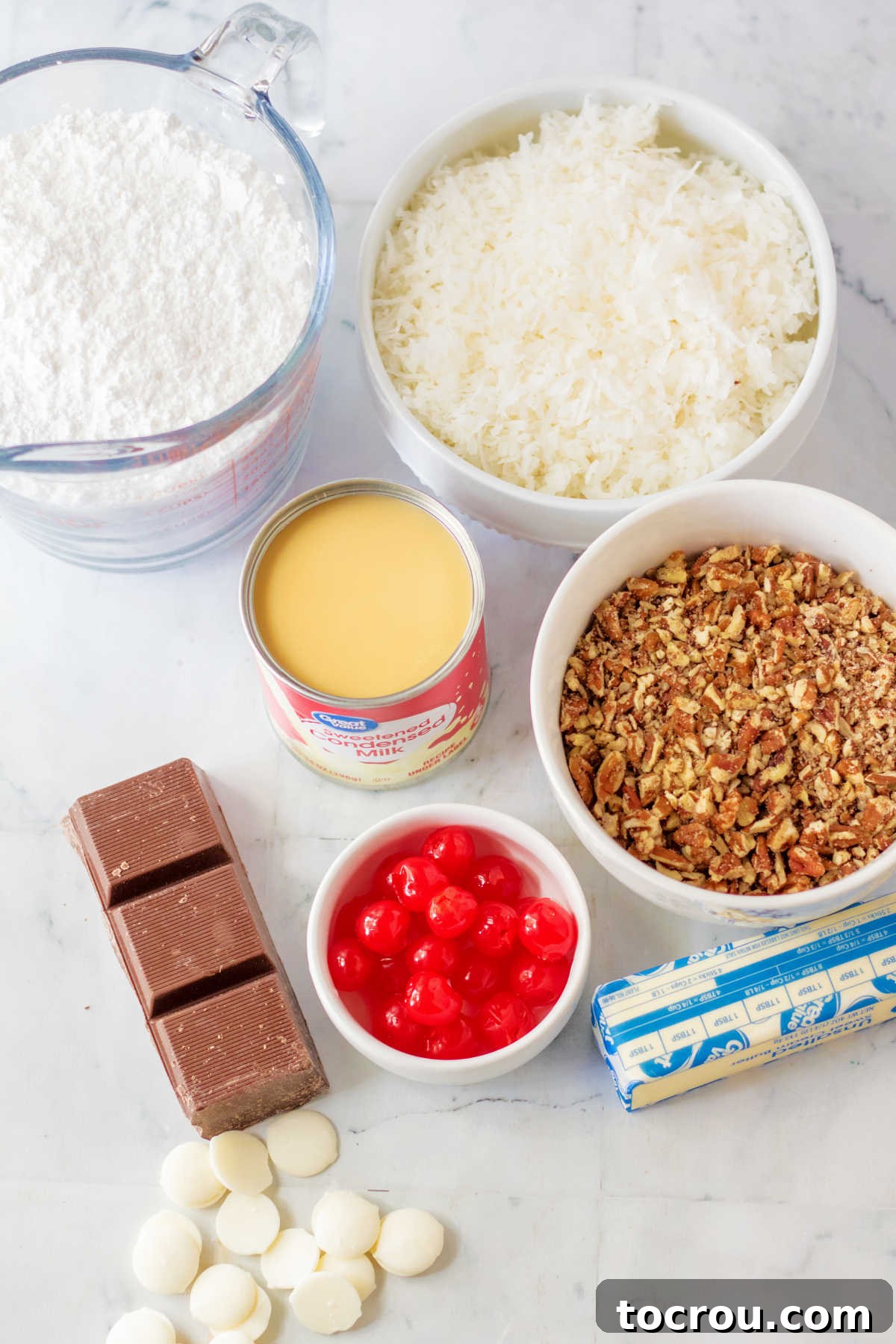 Ingredients for cherry coconut bonbons laid out, ready for preparation.