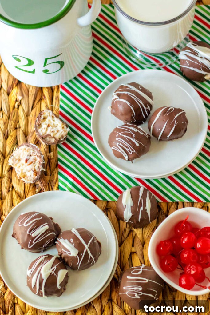 Overhead view of plates filled with Martha Washington candies, with one candy broken open to show its luscious creamy center.