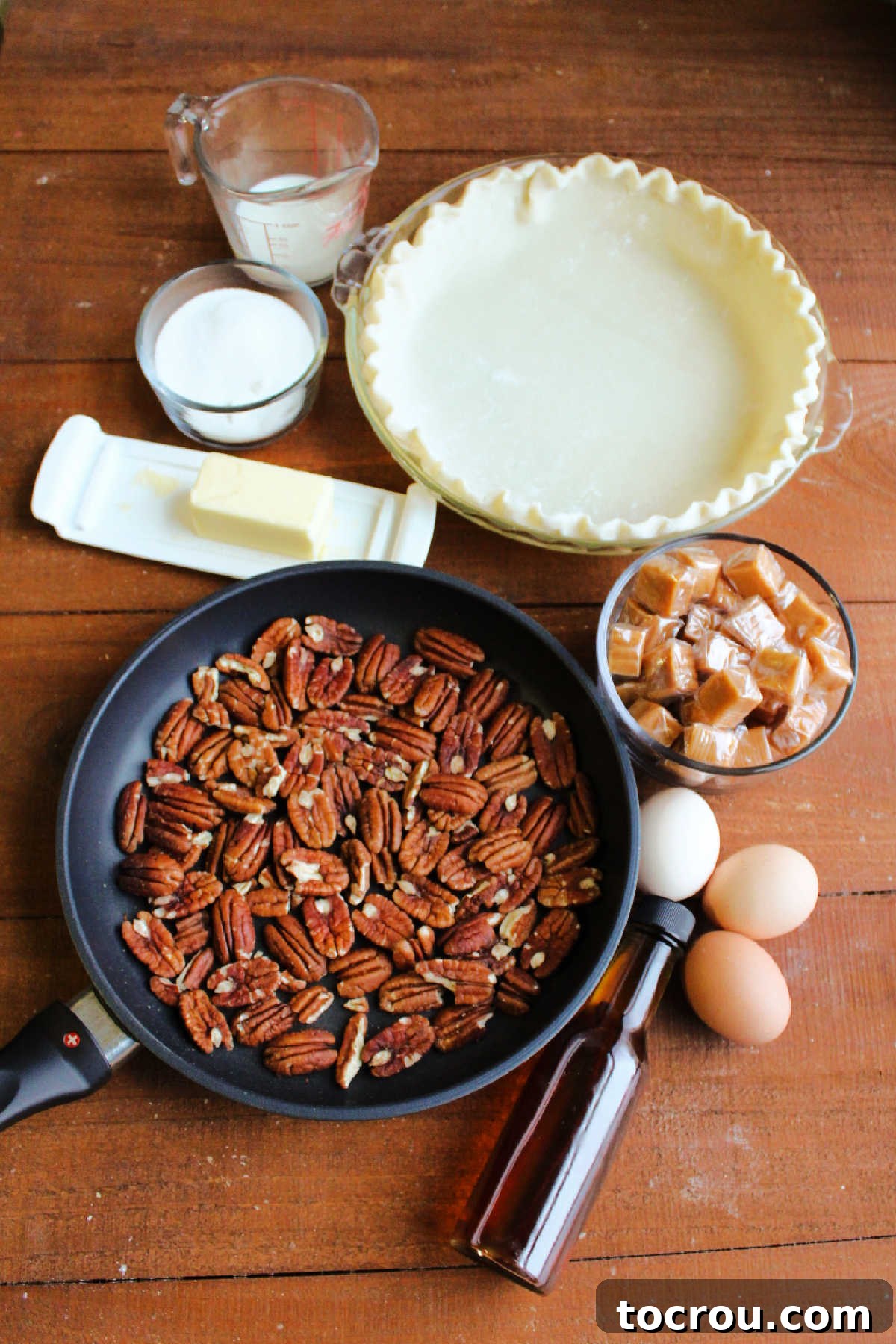 Golden Caramel Pecan Delight 3 Ingredients for pie: pecans, butter, sugar, milk, pie crust, caramels, eggs and vanilla.