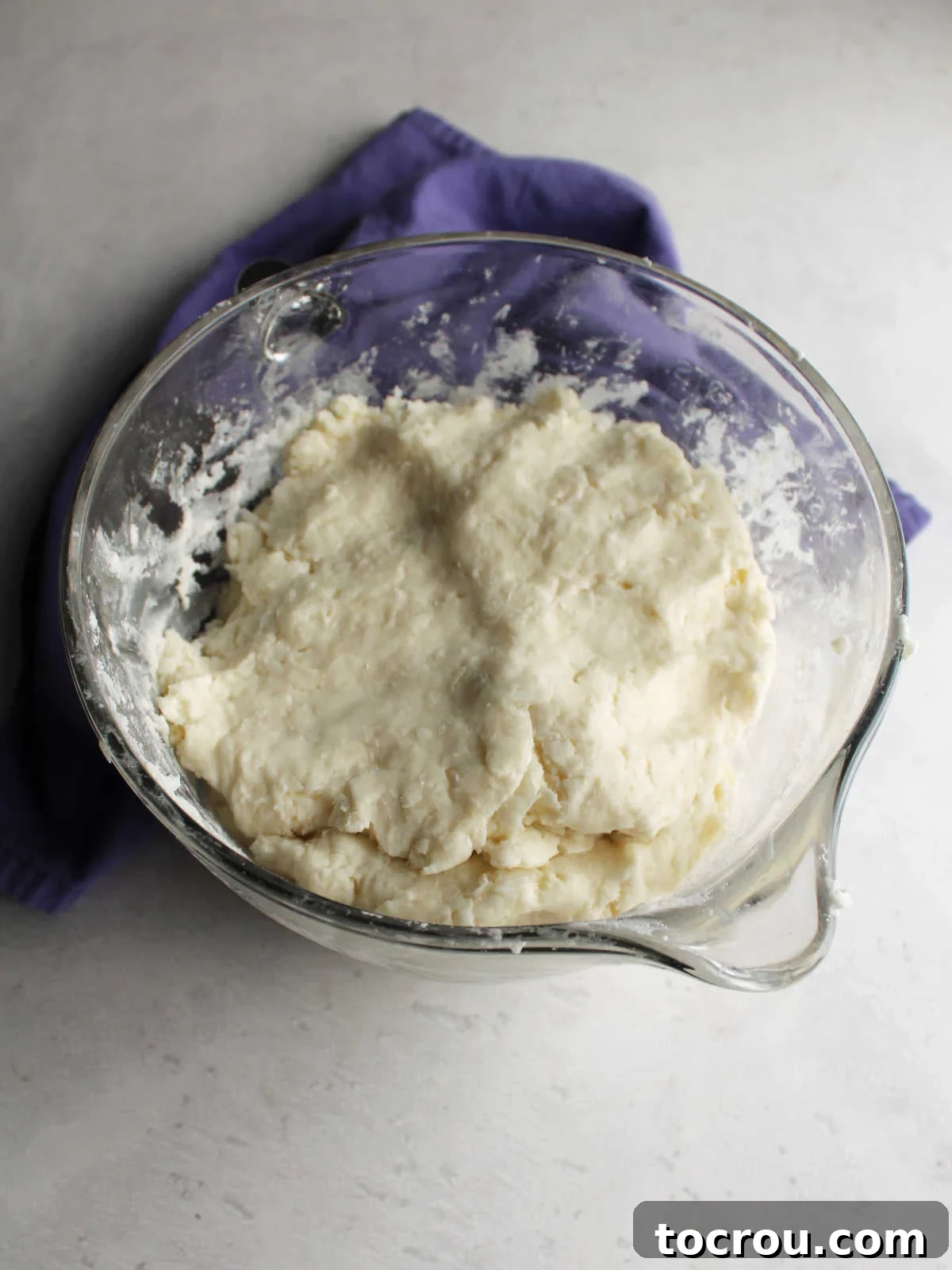 Bowl of stiff coconut bon bon filling without pecans.