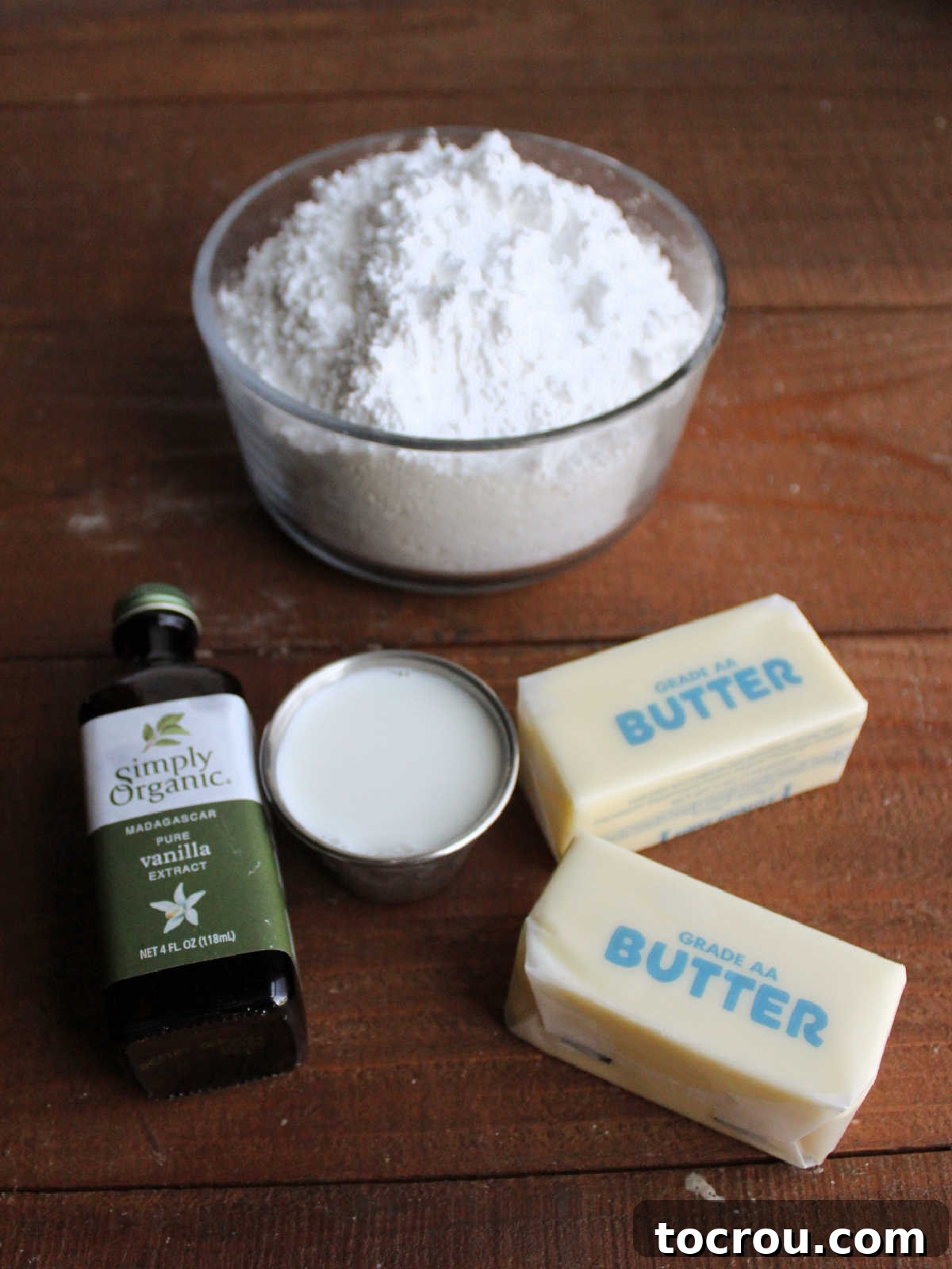 Frosting ingredients including butter, milk, vanilla, and powdered sugar. 