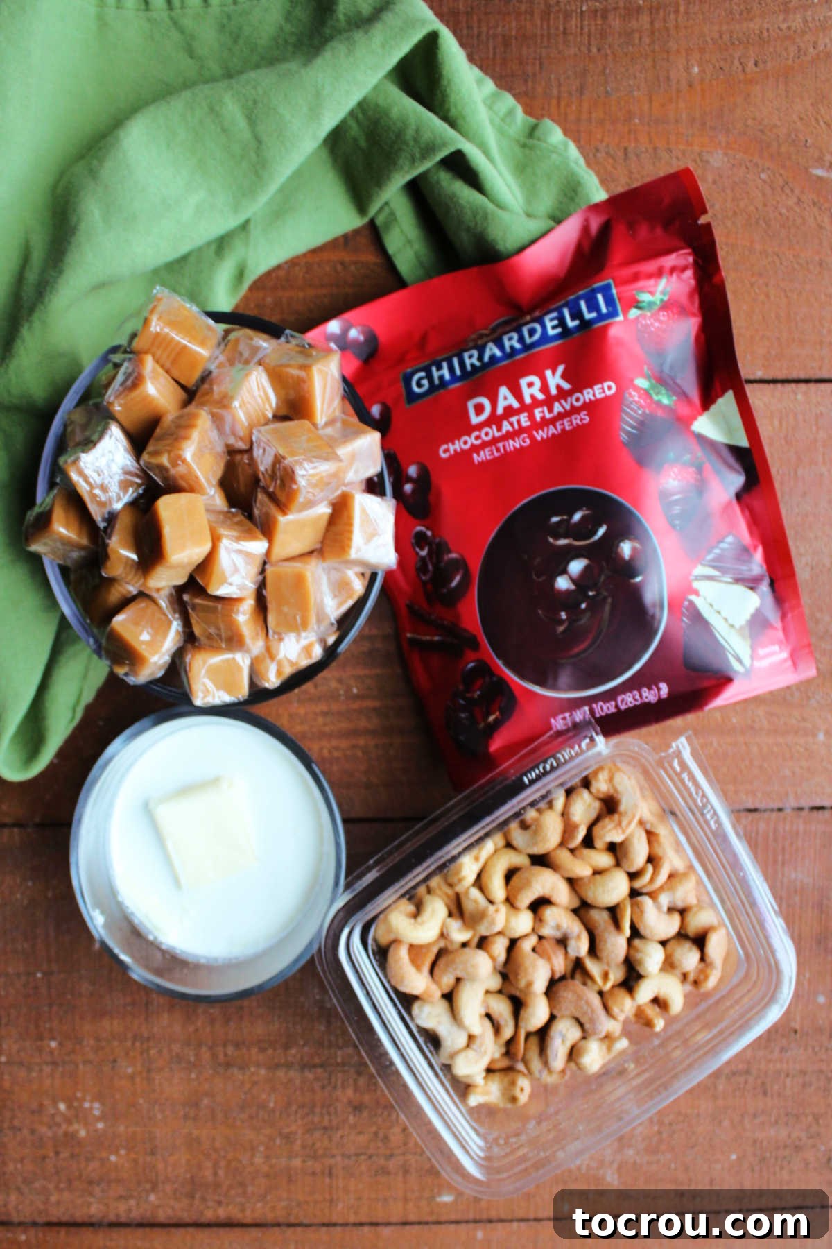 Ingredients for Caramel Cashew Bear Paws Ingredients: caramel candies, cream, butter, cashews and chocolate ready to be made into bear paws.