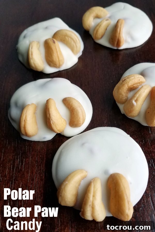 White Chocolate Polar Bear Claws White chocolate dipped caramel and cashew polar bear paw candies.