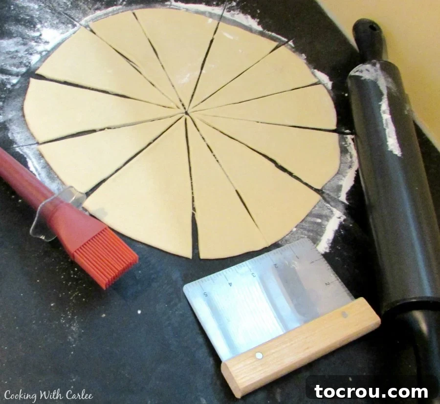 homemade crescent roll dough rolled into circle and cut into wedges.