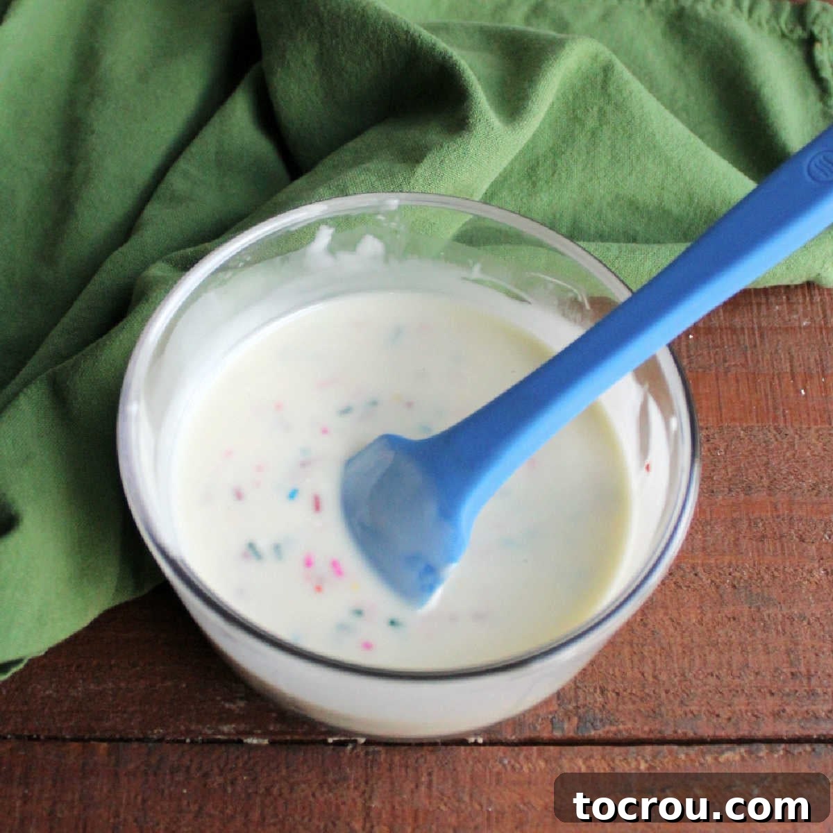 DIY Unicorn Rainbow Glaze 8 Bowl of white chocolate funfetti magic shell, ready to use on ice cream.