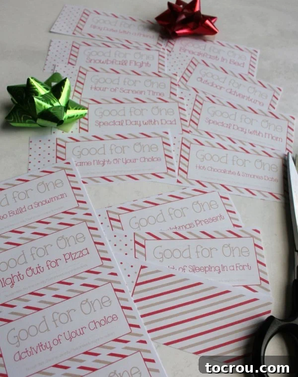 Enjoy the magic of Christmas and make memories with your favorite kiddos by printing this free coupon book and enjoying the activities. You can have your coupon book put together in just a couple of minutes and have memories that will last a lifetime! pages of Christmas coupon book for kids partial cut into individual coupons.