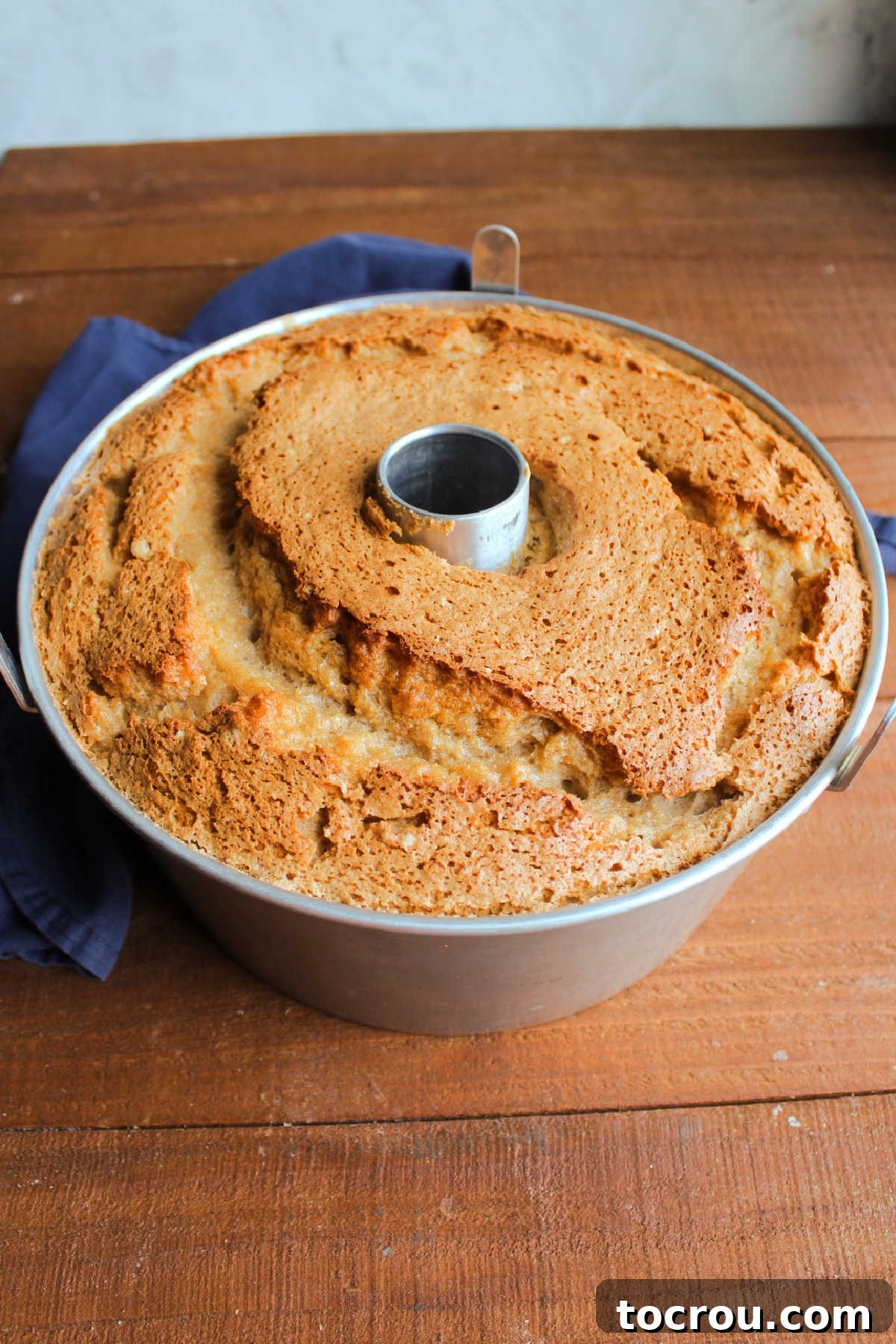 Golden brown coffee angel food cake fresh from the oven.
