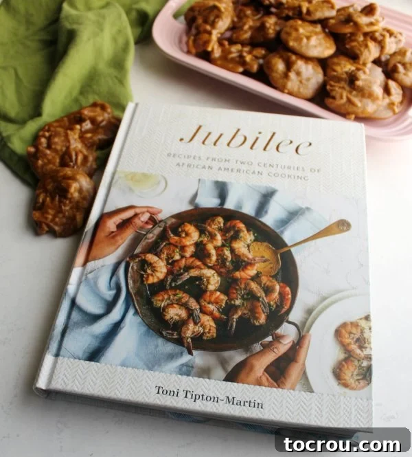 Buttery Sweet Southern Pecan Pralines 6 An inviting display of Southern pecan pralines, with the 'Jubilee' cookbook elegantly placed beside them.