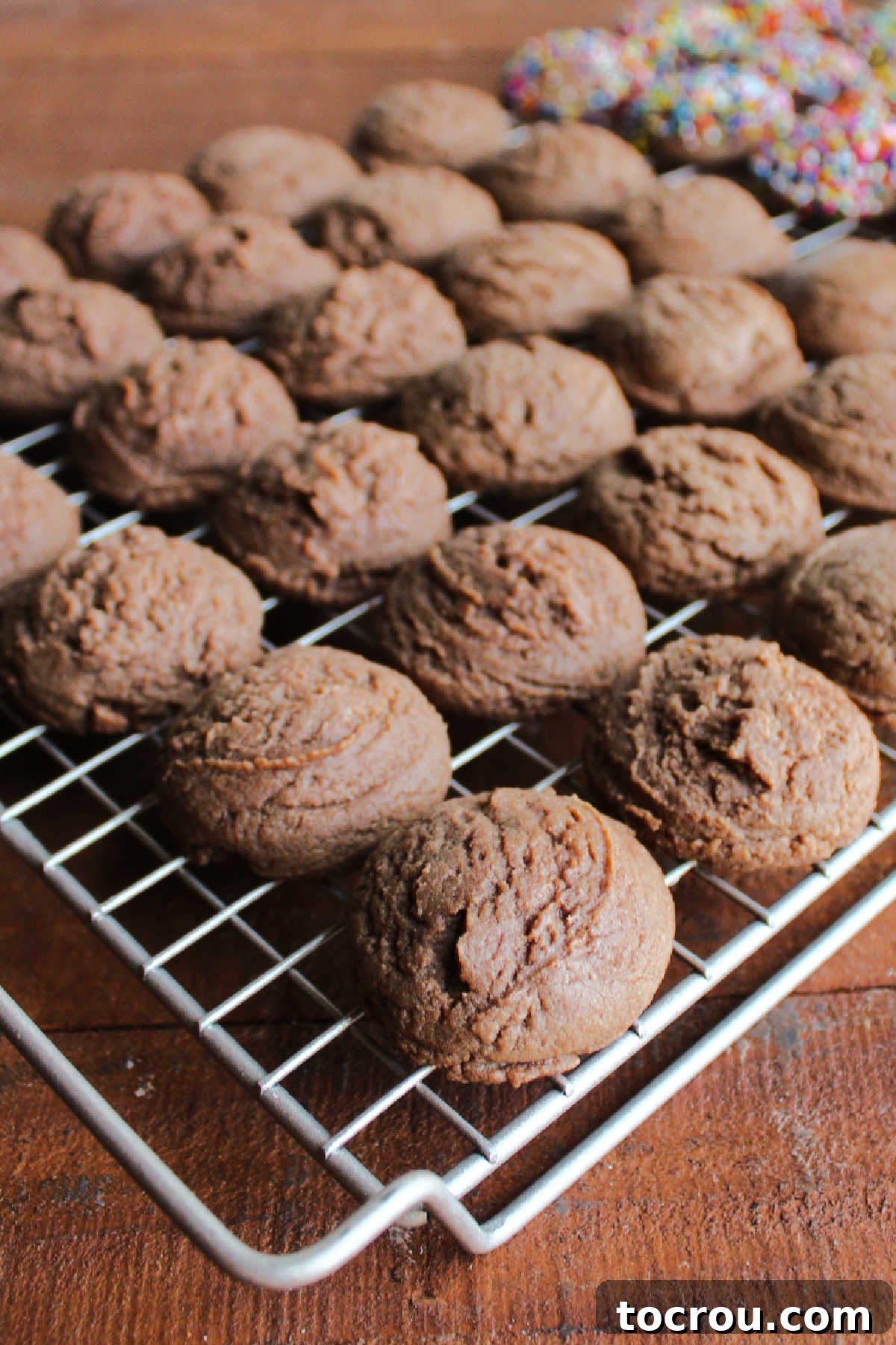 Perfectly Cooled Chocolate Condensed Milk Cookies Chocolate condensed milk cookies cooling on wire rack.