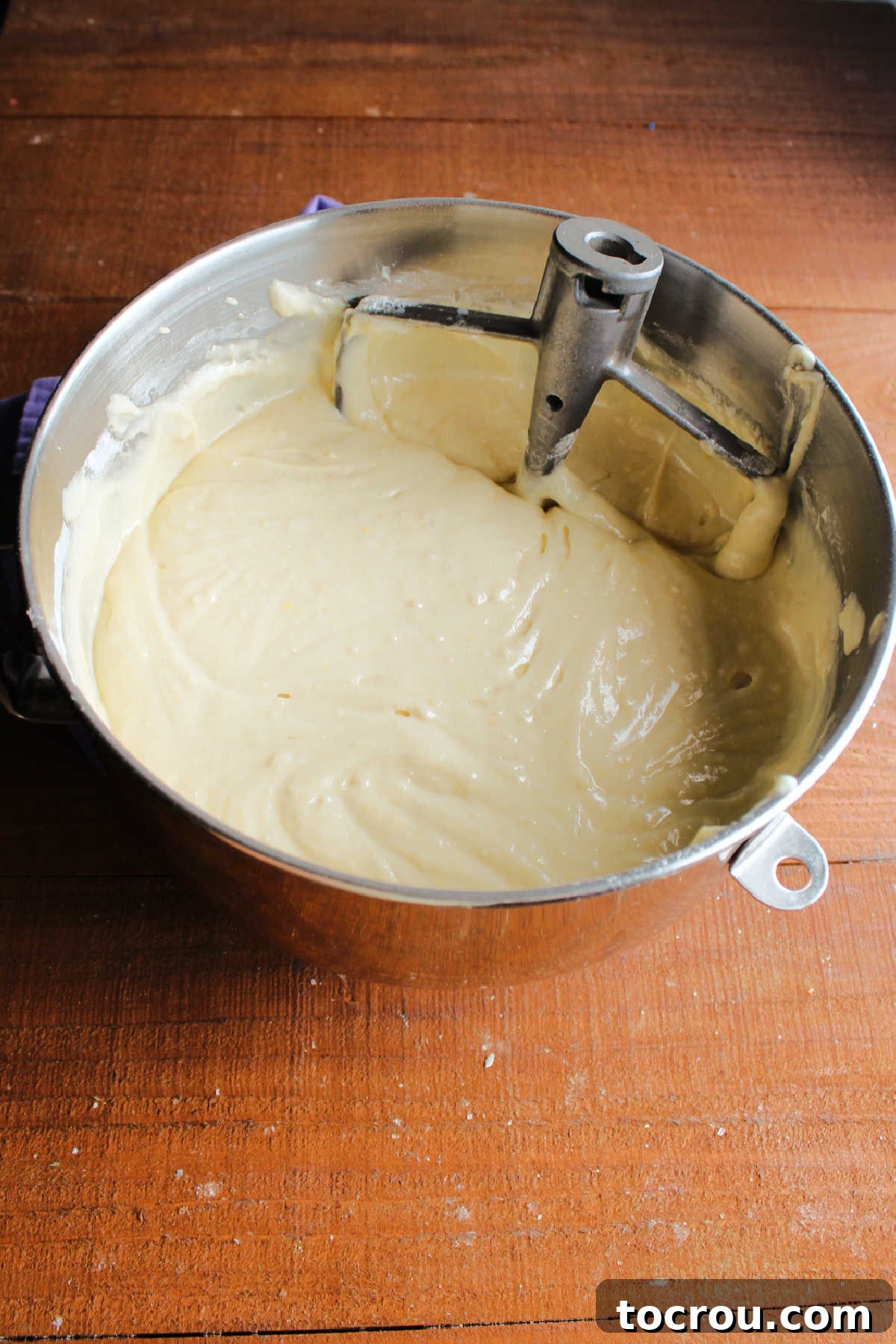 The 10-Inch Vanilla Classic 8 Mixer bowl of completed vanilla cake batter showing thick texture.