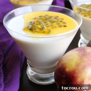 Tangy Yogurt Panna Cotta 2 Glass filled with smooth white yogurt panna cotta topped with yellow passion fruit.