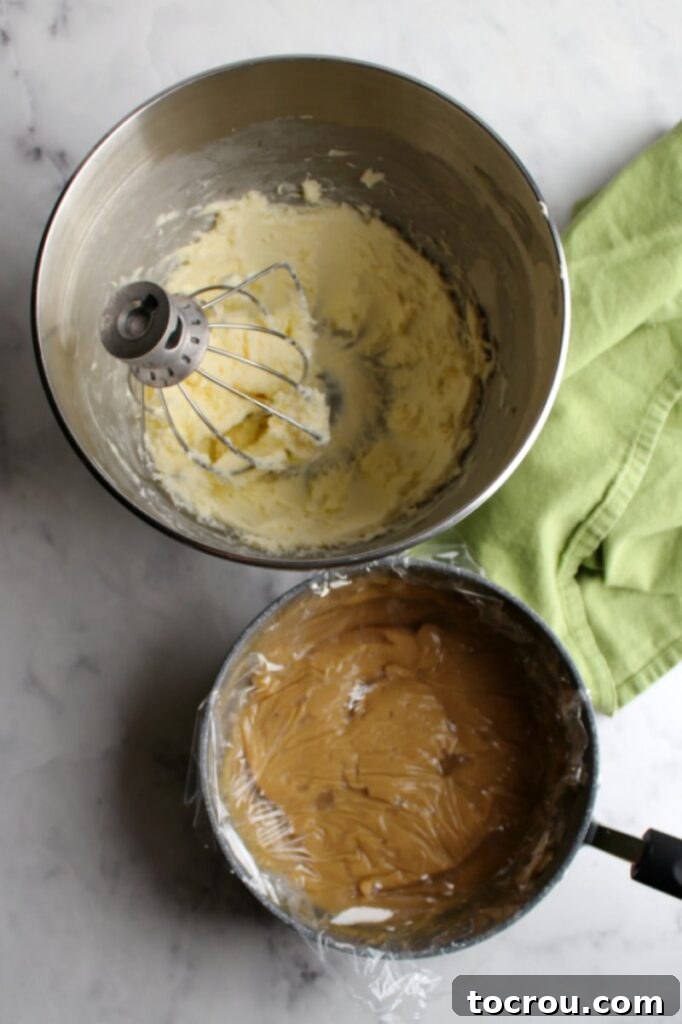 whipped butter in stand mixer bowl with plastic wrap covered chilled brown sugar custard mixture nearby ready to be added