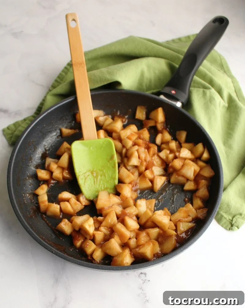 Luscious No-Bake Caramel Apple Cake 2 diced apples cooked in brown sugar and cinnamon for the caramel apple topping.