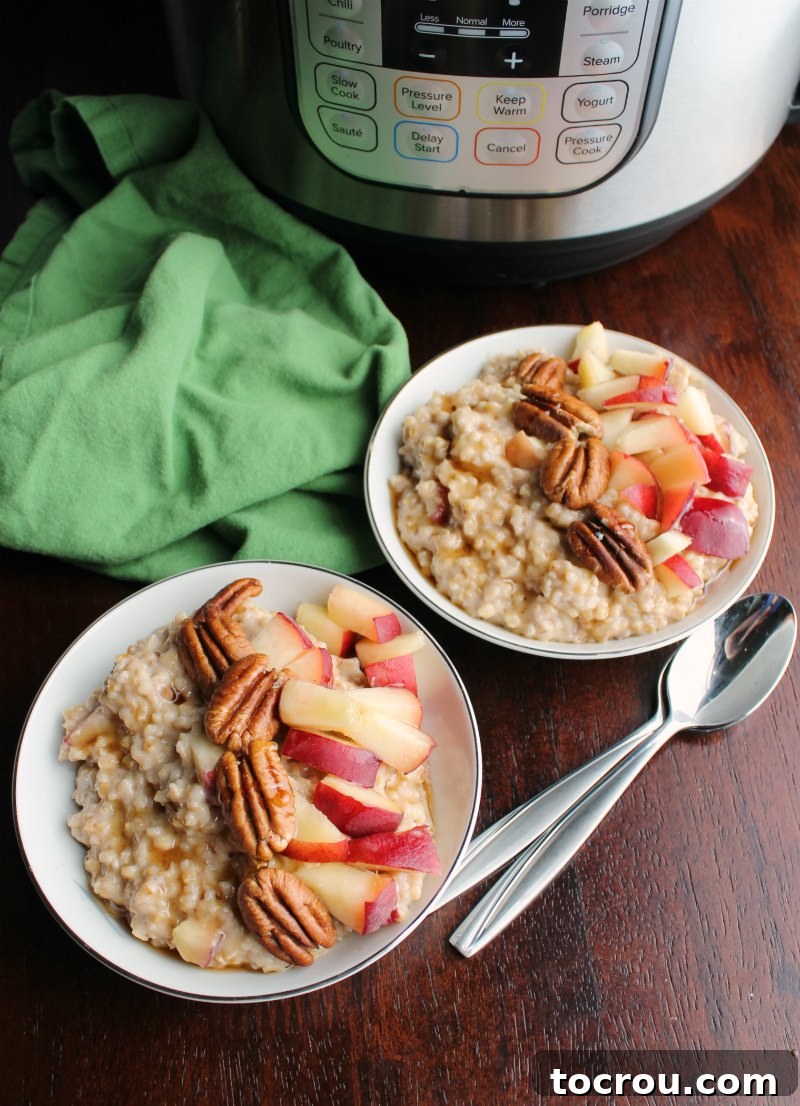 Bowls of maple cinnamon steel cut oatmeal with peaches and pecans in front of pressure cooker.