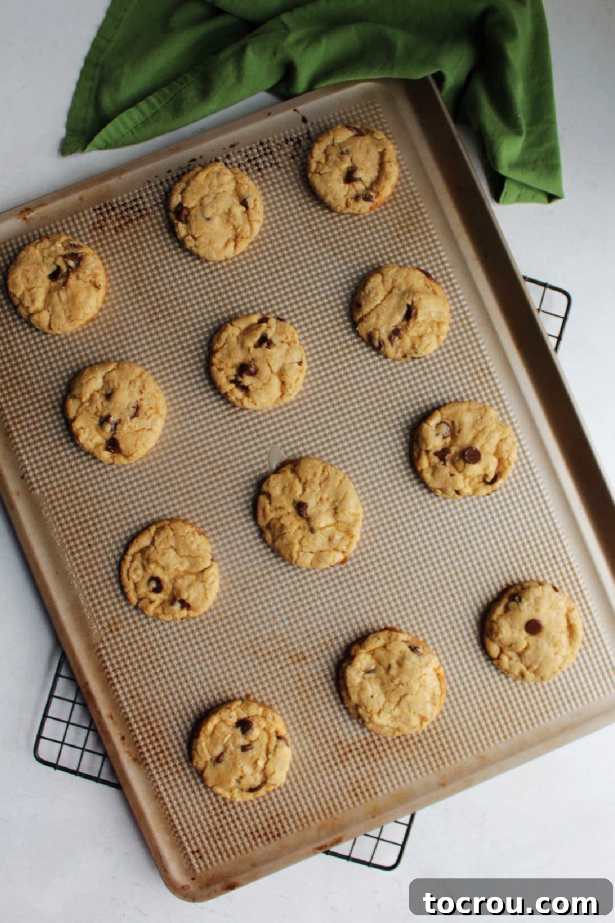 Cookie pan filled with a dozen fresh baked cowgirl cookies.