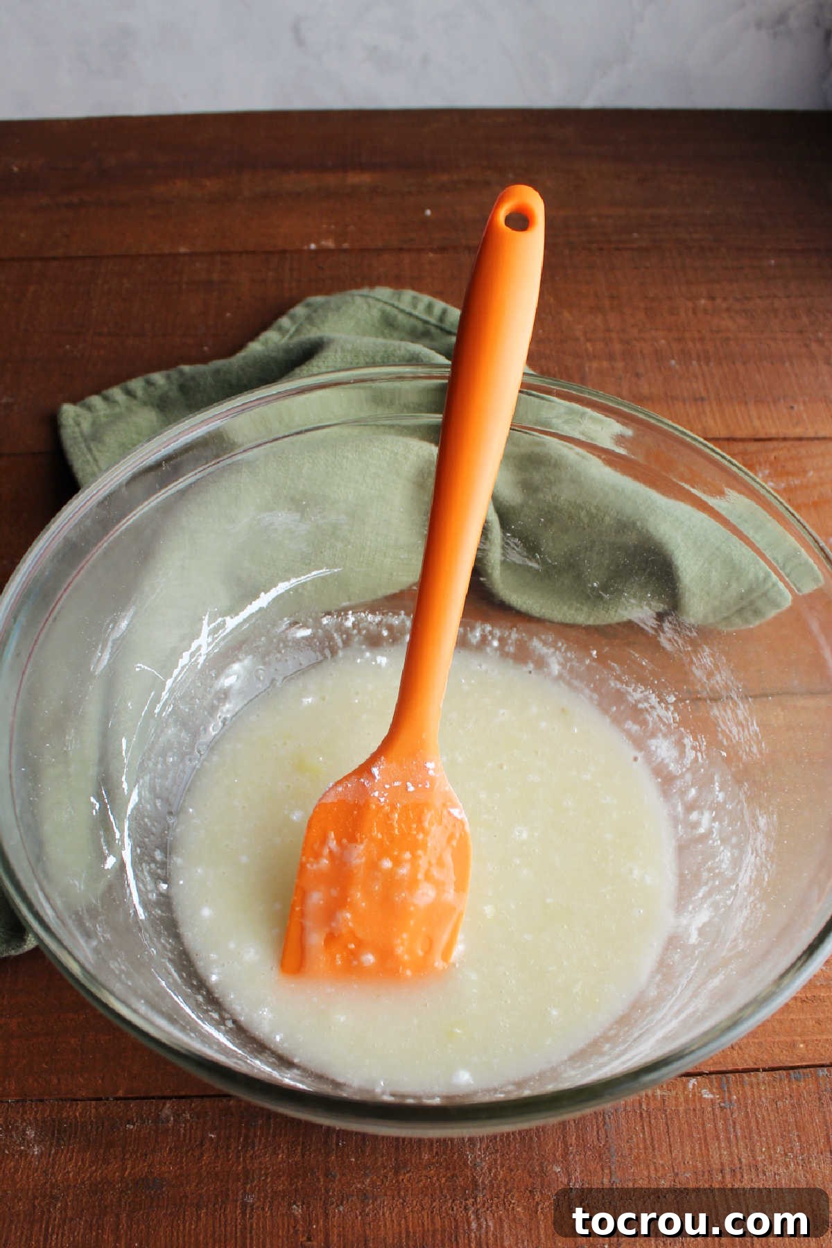 Potato and Sugar Mixture Bowl of liquid looking mixture that results from mixing together the mashed potatoes and first couple of cups of powdered sugar.