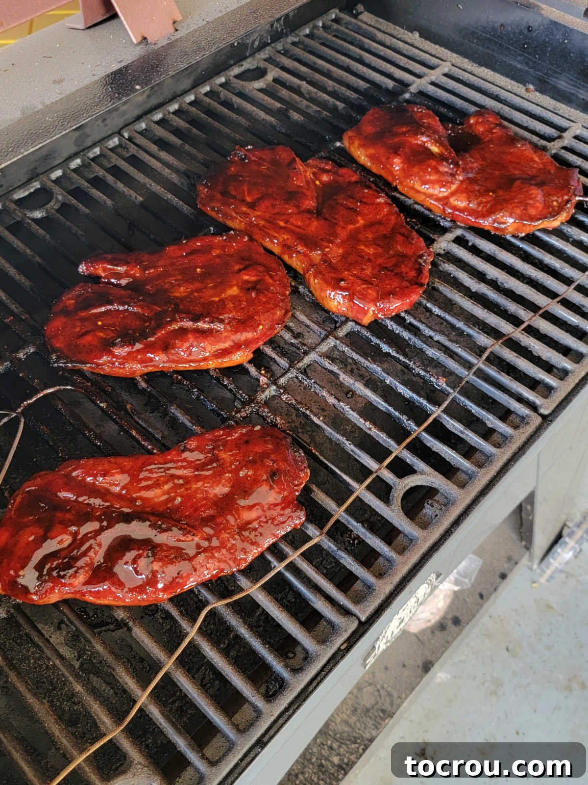 Smoky Perfection: Pellet Grill Pork Steaks 8 Sauced bbq pork steaks are back on the grill grates, they are tender and now just need some caramelization.