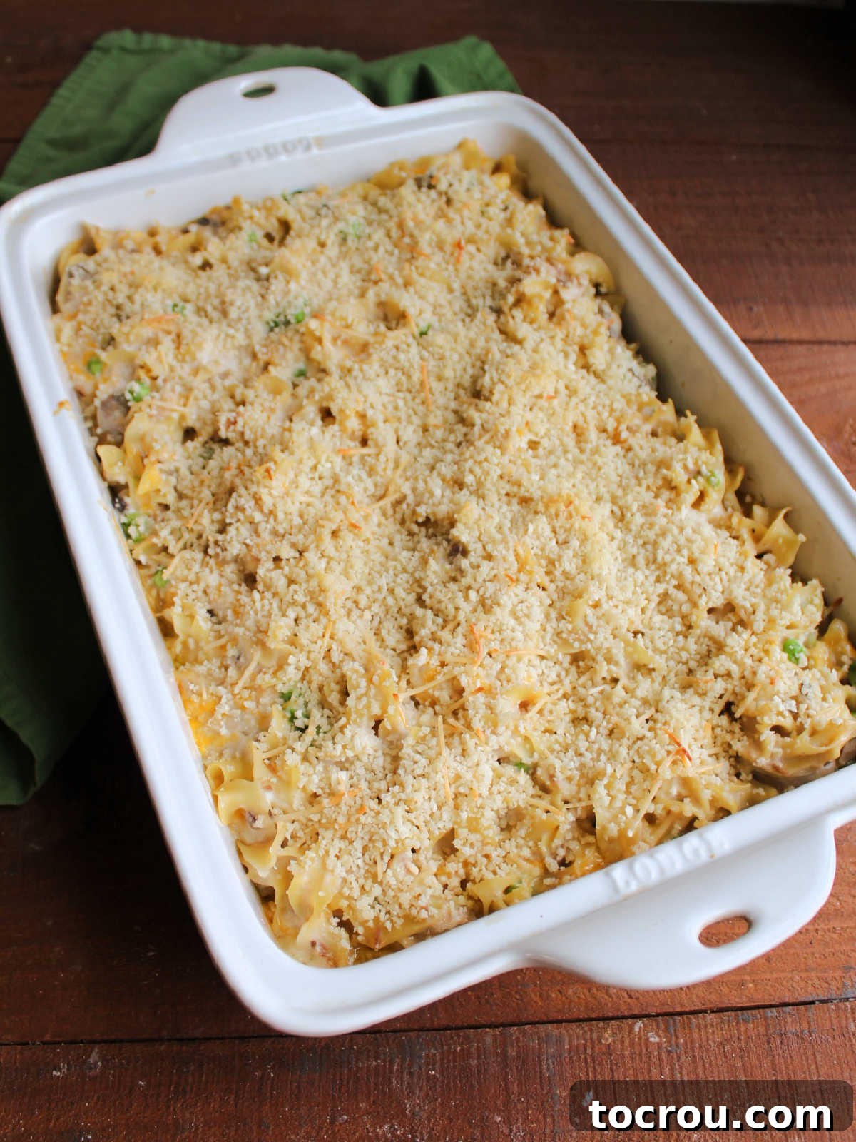 Hearty Tuna Noodle Casserole 9 Freshly baked tuna noodle casserole, showing a perfectly browned and crispy bread crumb topping, hot out of the oven.