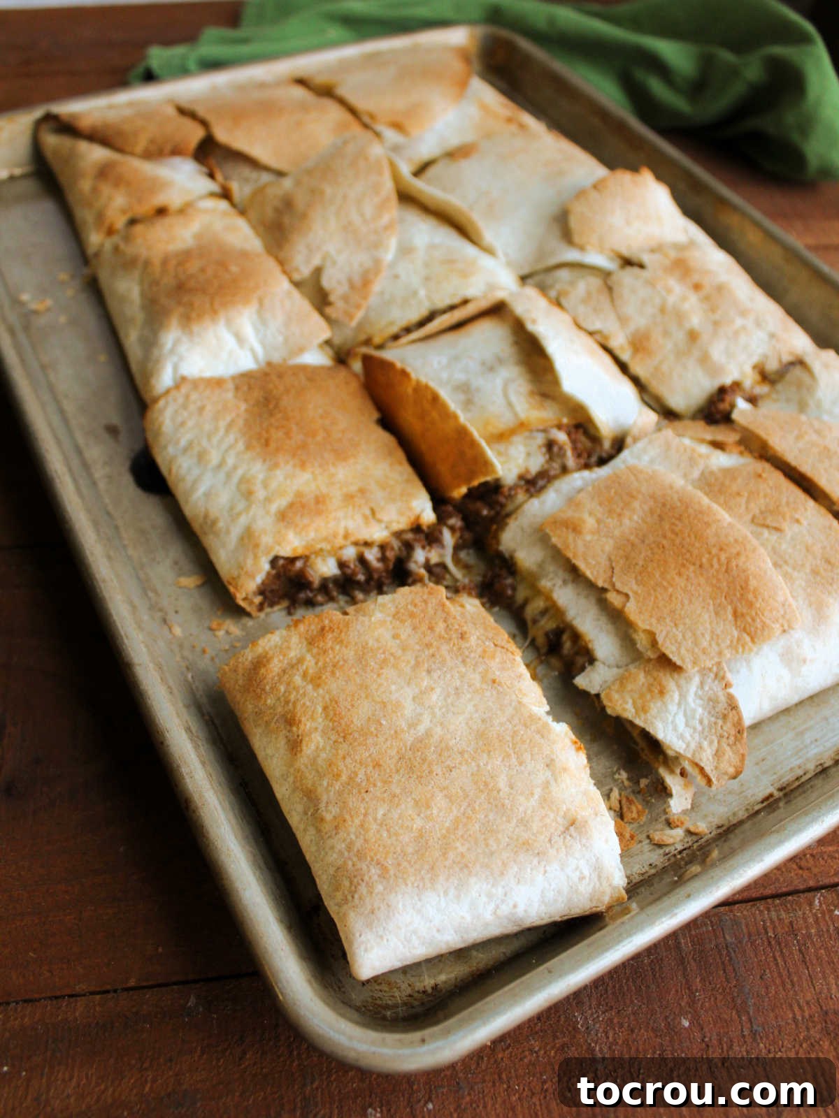 Sheet Pan Quesadilla Bake 9 Baked sheet pan quesadilla cut into squares, ready to be served.